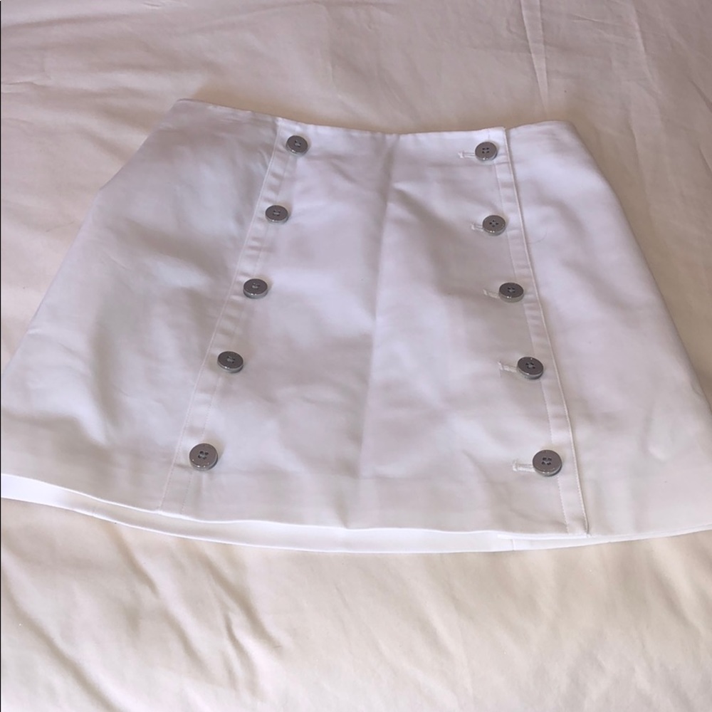 white skirt with buttons, in silver, use twice